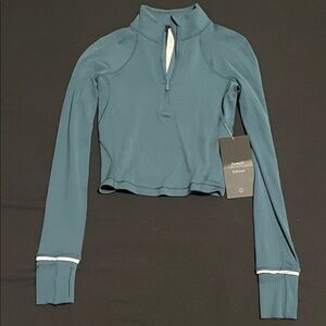 Green jasper it’s rulu run ribbed cropped half zip